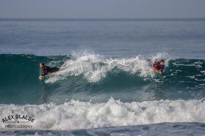 Adriano and Raphael sharing a wave